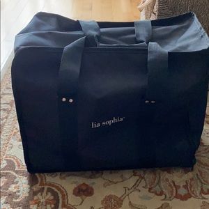 Carrying case. Great to hold jewelry cases